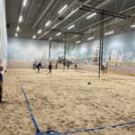 Beach sports arena with heated sand